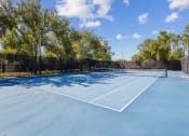 Thumbnail 21 of 30 - Tennis & Pickleball Court at Ashlar apartments in Fort Myers, Florida