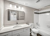 Thumbnail 5 of 30 - a bathroom with a sink toilet and bathtub at Stonelake at the Arboretum, Austin, TX