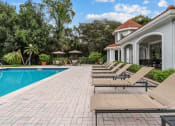 Thumbnail 16 of 30 - Poolside Seating at Cypress Shores, Coconut Creek, FL, 33063
