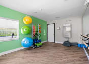 Thumbnail 27 of 33 - a yoga room with green walls at Edgebrook Residences, New Hampshire, 03054