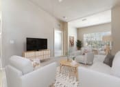 Thumbnail 5 of 31 - a living room with white furniture and a television at Grandeville on Saxon, Orange City, FL