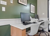 Thumbnail 24 of 33 - a business center with two computers at Edgebrook Residences, New Hampshire