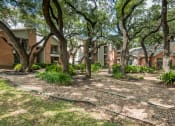 Thumbnail 31 of 31 - Courtyard view at Village Oaks Apartments, Austin