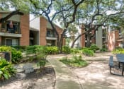 Thumbnail 1 of 31 - Picnic area at Village Oaks Apartments, Texas, 78759