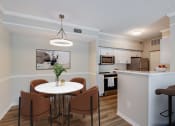 Thumbnail 9 of 30 - Kitchen and dining area at Ashlar, Fort Myers, 33907
