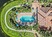 Thumbnail 9 of 29 - Aerial Pool View at Bay Breeze Villas, Fort Myers, FL, 33908