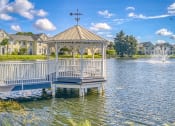 Thumbnail 19 of 20 - an outdoor patio with tables and umbrellas  at Bay Harbor, Fort Myers