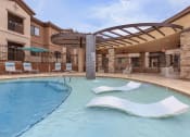 Thumbnail 35 of 50 - Resort style swimming pool at The Canyons at Linda Vista Trail, Oro Valley, Arizona
