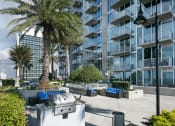 Thumbnail 17 of 27 - Outdoor patio with grills at Element, Florida, 33602