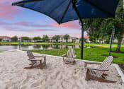 Thumbnail 7 of 46 - Relax in the adirondack chairs by the water at Cypress Legends, Fort Myers, 33905