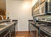 Thumbnail 15 of 21 - Kitchen at High Oaks, Austin, Texas