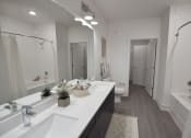Thumbnail 15 of 28 - Bathroom with double sink at The Maven, Georgia, 30024