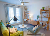 Thumbnail 21 of 28 - Living room with ceiling fan  at The Maven, Georgia, 30024