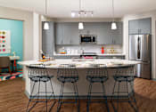 Thumbnail 3 of 35 - Kitchen with island  | District at Rosemary at The District at Rosemary, Sarasota, 34236
