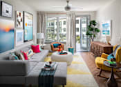Thumbnail 1 of 35 - Living room with patio access  | District at Rosemary at The District at Rosemary, Florida