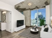Thumbnail 3 of 27 - a living room with white walls and a large window at Element, Florida