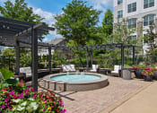 Thumbnail 3 of 40 - our apartments offer a clubhouse with a pool at Emblem Alpharetta, Alpharetta, GA, 30009