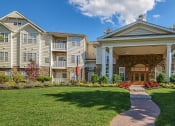Thumbnail 7 of 26 - Entrance to clubhouse and leasing office  at Highlands at Faxon Woods, Quincy
