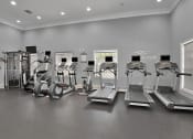 Thumbnail 19 of 38 - Fitness Center with Cardio Machines at Floresta, Jupiter, FL
