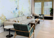 Thumbnail 6 of 28 - Common area seating with window seat at The Maven, Georgia, 30024