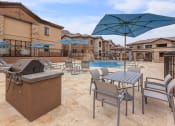 Thumbnail 48 of 50 - Poolside patio with grills at The Canyons at Linda Vista Trail, Oro Valley, Arizona