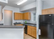 Thumbnail 18 of 46 - Kitchen with Electric Appliances at Cypress Legends, Fort Myers, 33905