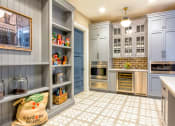 Thumbnail 17 of 37 - Clubhouse shelves at Wharf 7 Apartments, Charleston, SC