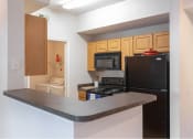 Thumbnail 23 of 46 - Updated Kitchen With Black Appliances at Cypress Legends, Fort Myers, 33905