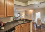 Thumbnail 4 of 21 - Kitchen with Breakfast Bar at Ballantrae Apartments, Sanford