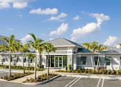 Thumbnail 15 of 19 - A building with a parking lot in front of it. at Lucie at Tradition Apartments, Port St. Lucie 34987