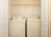 Thumbnail 20 of 31 - In home washer and dryer at Village Oaks Apartments, Austin, 78759