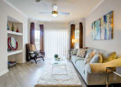 Thumbnail 11 of 14 - a living room with a couch and a coffee table at Thornberry Apartments, Charlotte, 28262