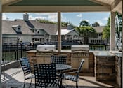 Thumbnail 29 of 43 - Community grills and covered lounge at Saddleworth Green, Ocala, FL