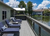 Thumbnail 25 of 43 - Lakeside lounge chairs at Saddleworth Green, Ocala, FL