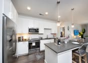 Thumbnail 5 of 24 - Kitchen with stainless steel appliances at Glenn Perimeter, Atlanta, 30328