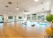 Thumbnail 9 of 49 - exercise studio room at Monterey Ranch, Texas, 78749