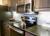 Thumbnail 15 of 41 - Kitchen  at The Park at Monterey Oaks, Texas, 78749