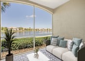 Thumbnail 6 of 29 - Enclosed patio with a water view