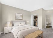 Thumbnail 1 of 29 - Large master bedroom with walk-in closet and en-suite bathroom.