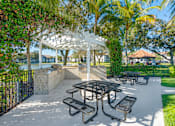 Thumbnail 8 of 32 - Community Grill and Outdoor Dining Area