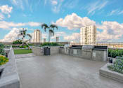 Thumbnail 23 of 48 - Grill and Dining area on top of the roof of Element apartments