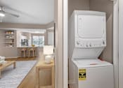 Thumbnail 8 of 49 - A white oven is in a kitchen with a fan on the ceiling.