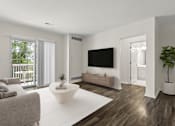 Thumbnail 2 of 34 - A modern living room with a grey couch, a white coffee table, and a flat screen TV.