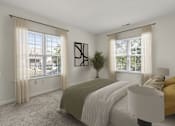 Thumbnail 4 of 34 - A bedroom with a bed, a chair, and a painting on the wall.