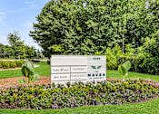 Thumbnail 42 of 42 - A sign in front of a tree reads 4255 Global Cave Adoremel.