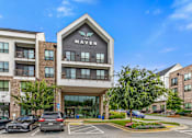 Thumbnail 41 of 42 - The MAVEN building is a modern multi-story residential complex.