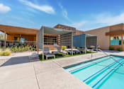 Thumbnail 16 of 29 - A modern house with a pool in the backyard.