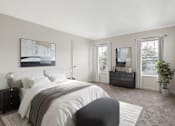 Thumbnail 7 of 26 - A bedroom with a large bed and a painting on the wall at Residences at Westborough Station, Westborough, MA
