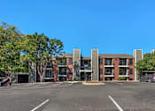 Thumbnail 1 of 27 - Parking lot in front of a multi-story apartment at Great Hills, Texas, 78759