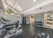 Thumbnail 14 of 27 - Spacious home gym with treadmills at Great Hills, Texas, 78759